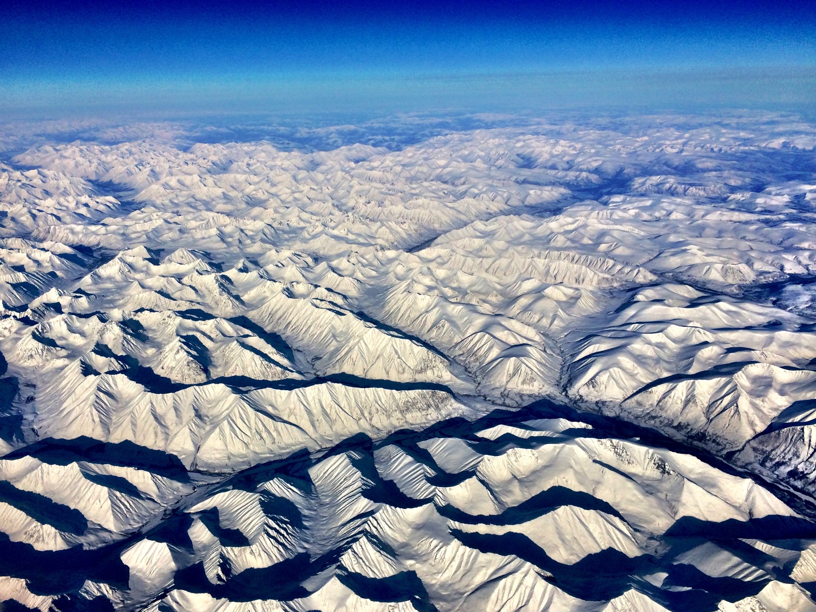 Aerial view of snow-covered mountains